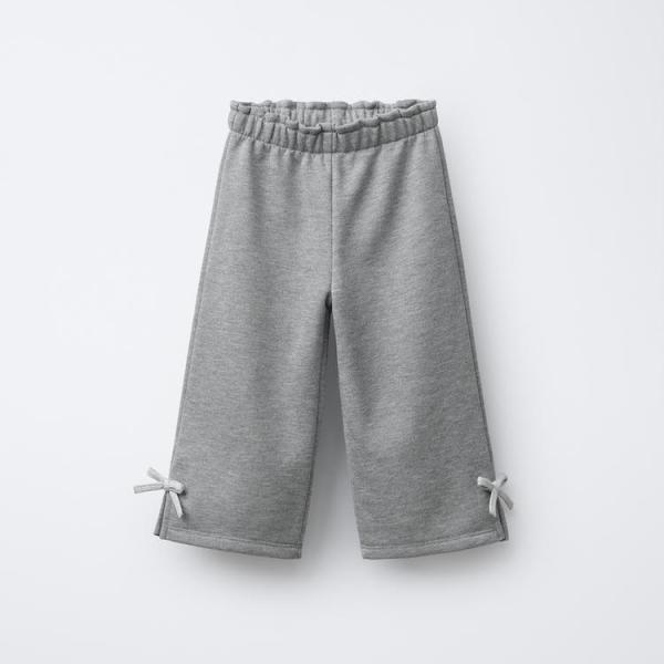 PLUSH TROUSERS WITH SHINY BOWS